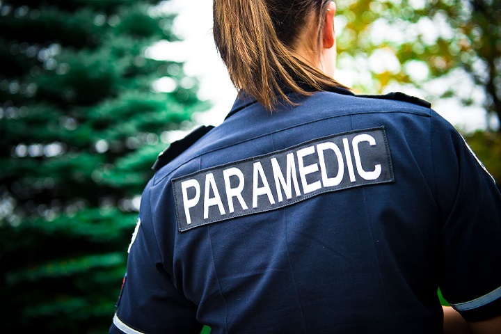 Paramedic standing with back to camera