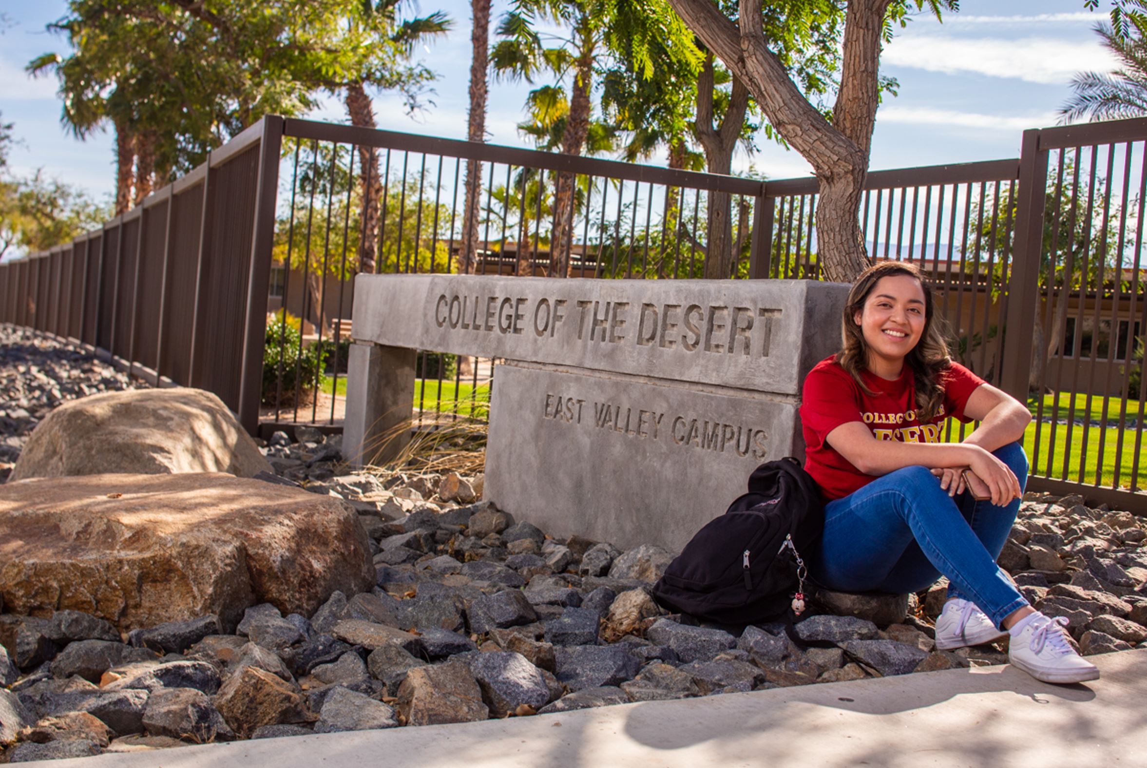 Student sitting in front of Mecca Thermal Campus